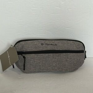 United x Therabody Amenity Kit Bag light gray and black